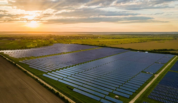 aerial-view-of-large-sustainable-electrical-power-plant-with-many-rows-of-solar-photovolta